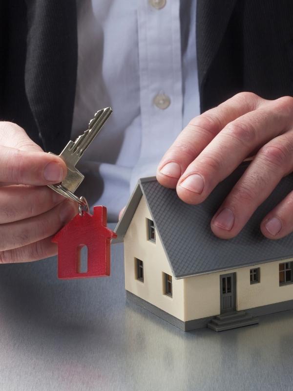 property manager close up holding house key aiken sc